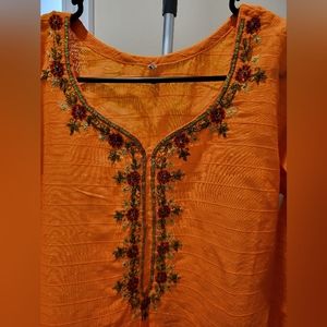 Brand new top with embroidered, sequences and beads work on front and sleeves